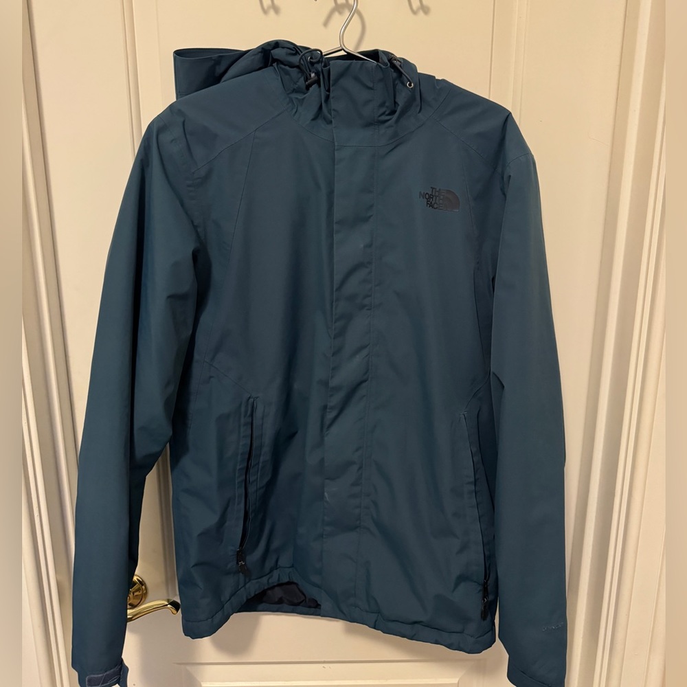 Hooded blue North face jacket